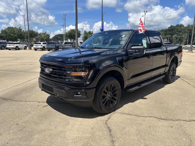 2026 Ford F-150 XLT in Agate Black Metallic — front three-quarter view