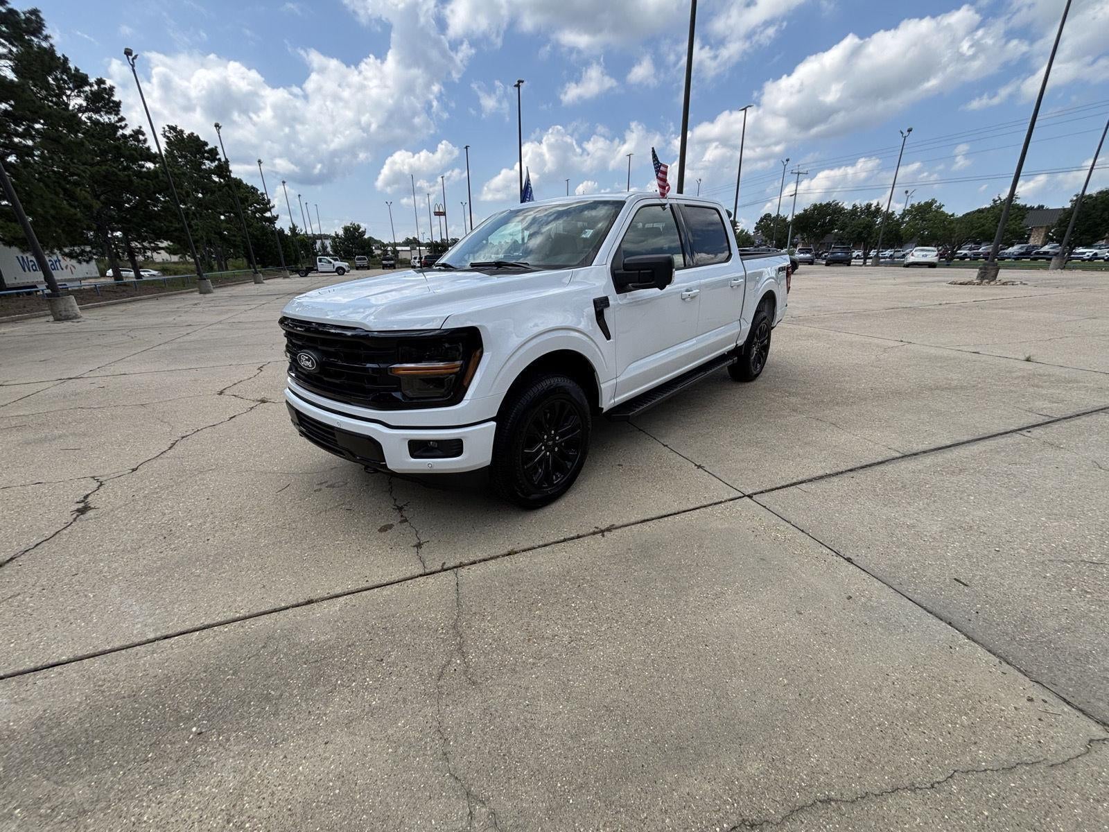 2026 Ford F-150 XLT in Oxford White — front three-quarter view