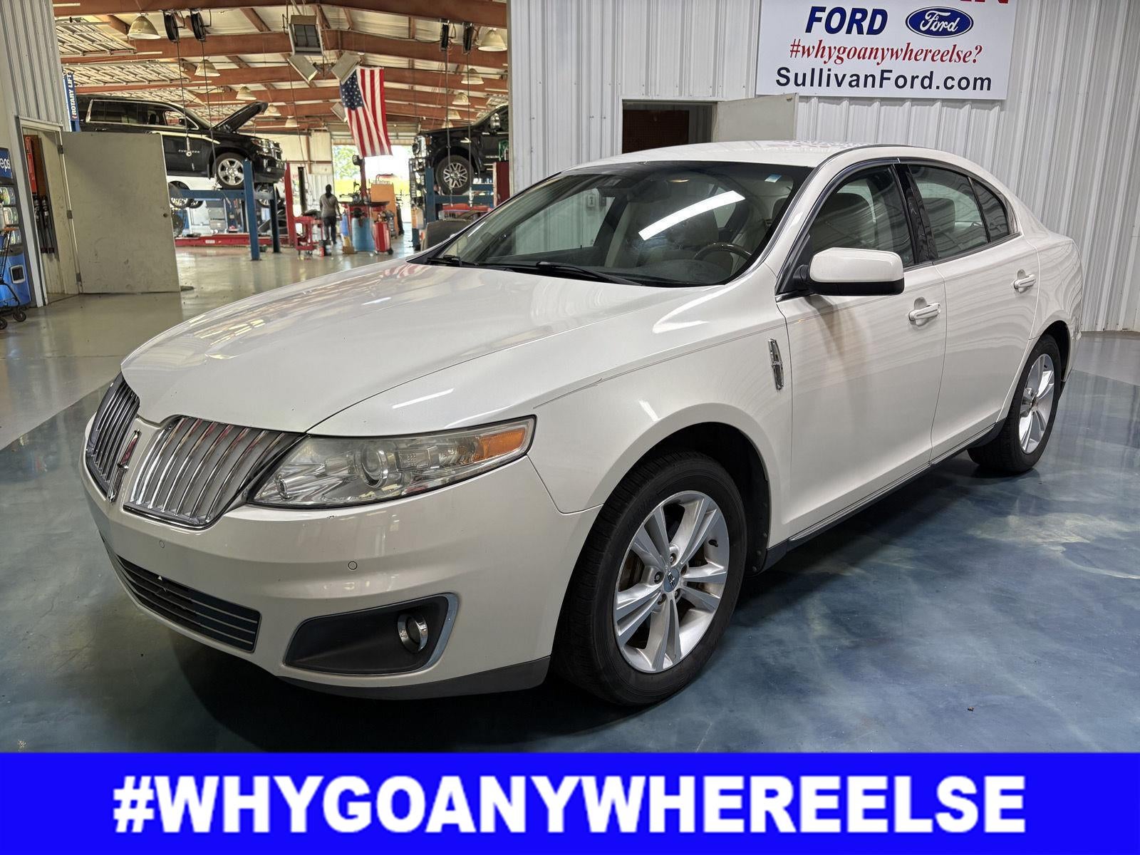 2009 Lincoln MKS 4DR SDN FWD in White — front three-quarter view